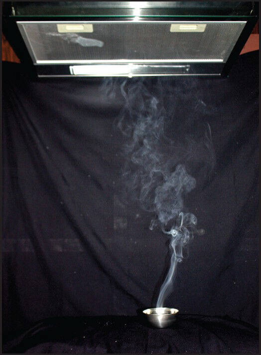 Artificial smoke produced with camphor to show the flow of smoke when the suction is at work