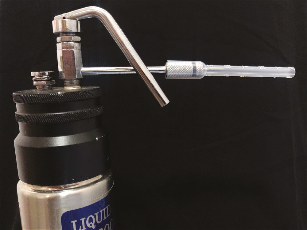 Customized plastic dropper as a disposable extension fitting over the standard straight tip cryocan nozzle